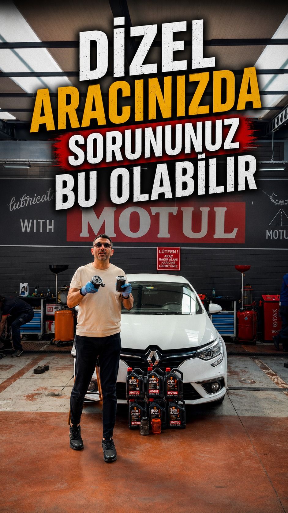 Candan atölyesinde Renault aracın yanında filtreleri gösteren teknisyen
